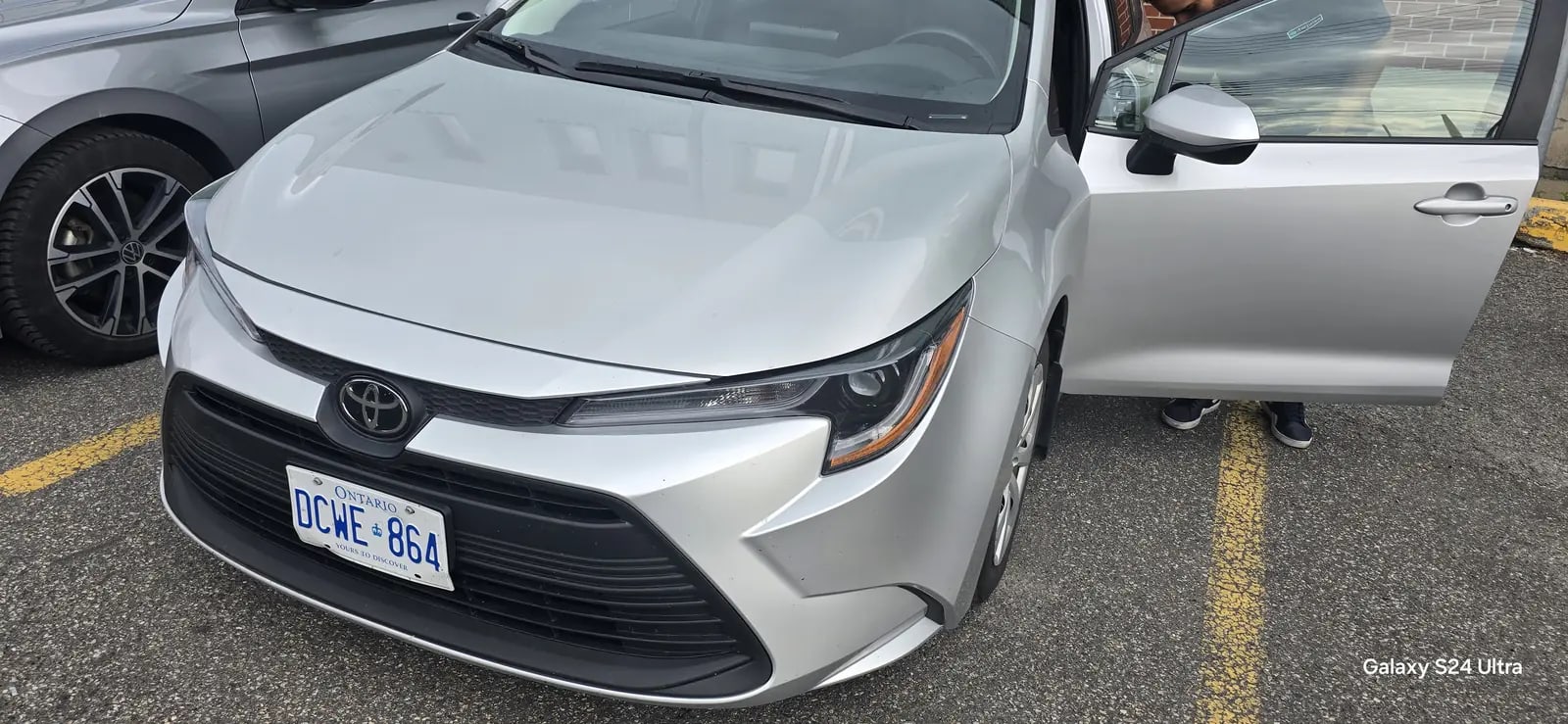 Clean silver Toyota sedan viewed from the front